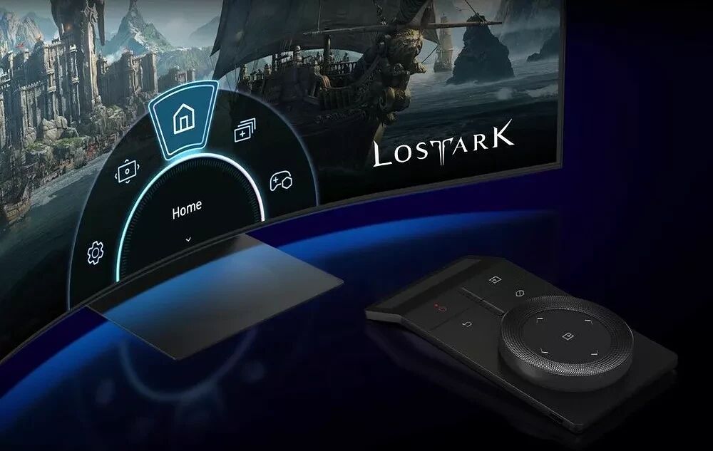Un écran de PC affichant le menu du jeu Lost Ark avec une interface circulaire, posé sur un bureau à côté d'une commande de contrôle noire.