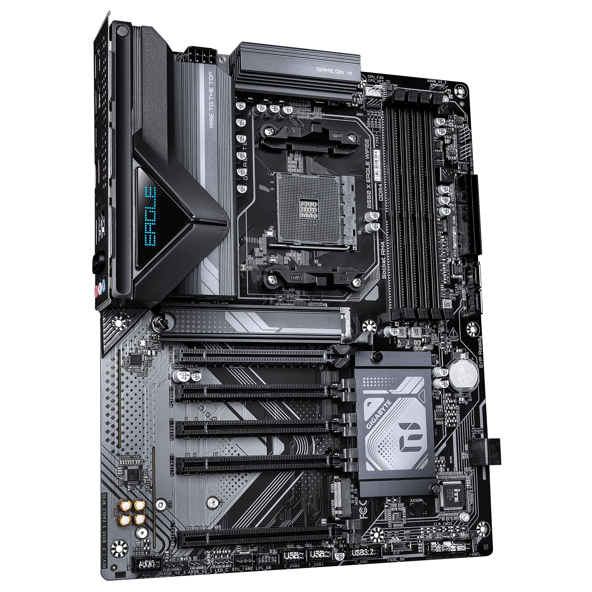 Carte mère Gigabyte Eagle AX avec dissipateurs thermiques noirs et motifs gris, équipée de plusieurs emplacements pour mémoire RAM et ports PCIe.