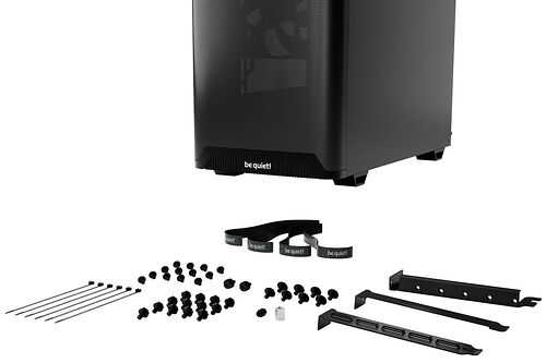 Boîtier PC noir de la marque be quiet! accompagné de divers accessoires de montage comme des vis, des entretoises et des supports.