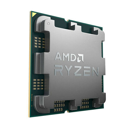Processeur AMD Ryzen sur son support vert, avec le logo de la marque gravé sur le dessus métallique.