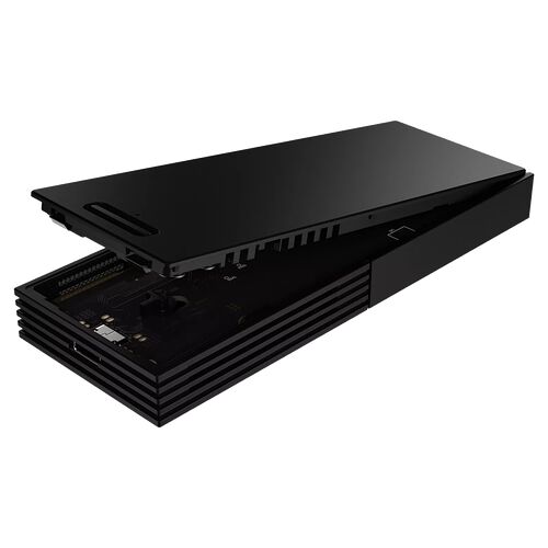 Console de jeux vidéo noire avec son capot supérieur légèrement soulevé, révélant une partie de la structure interne.