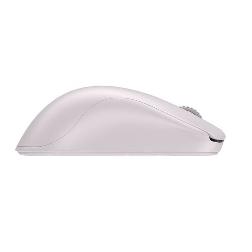 Souris d'ordinateur sans fil de couleur rose pâle avec un design ergonomique et profilé.