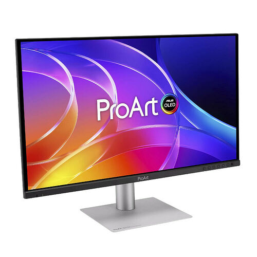Écran Asus ProArt OLED avec un design fin et un pied argenté, affichant un fond d'écran coloré et abstrait.