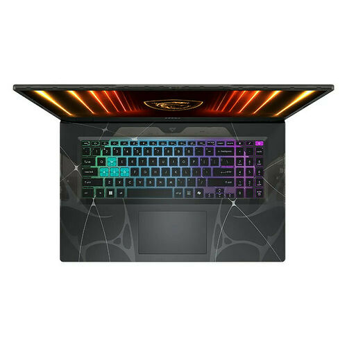 Un ordinateur portable gamer avec un clavier rétroéclairé multicolore et un motif graphique sur le capot.