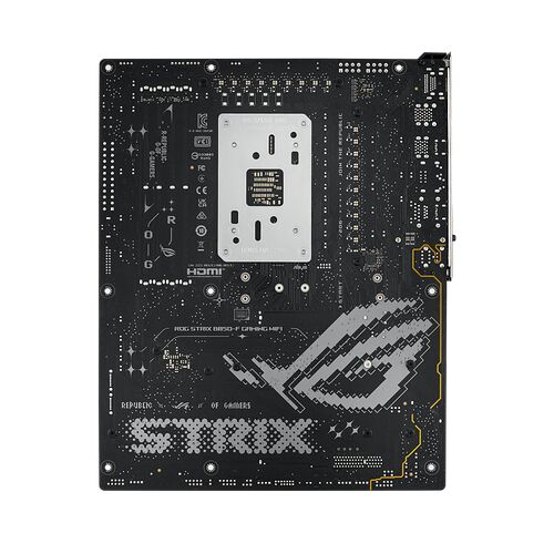 Vue arrière d'une carte mère ASUS ROG Strix noire avec des motifs graphiques gris et des détails dorés.