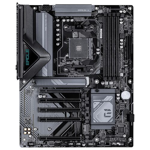 Carte mère Gigabyte avec dissipateur thermique sur le socket CPU et quatre emplacements pour mémoire RAM.