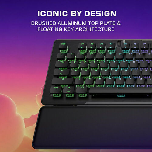 Clavier gamer avec rétroéclairage RGB et architecture à touches flottantes, présentant un châssis noir avec une plaque supérieure en aluminium brossé.