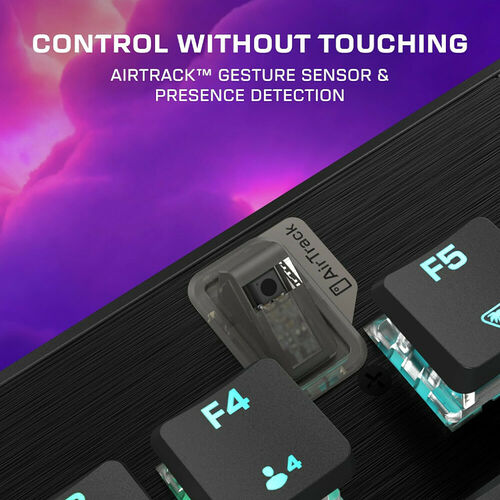 Un clavier avec un capteur de gestes AirTrack intégré, permettant de contrôler l'ordinateur sans contact physique. Le capteur est situé entre les touches F4 et F5.