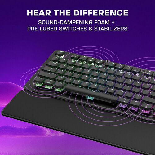 Clavier mécanique rétroéclairé avec mousse d'amortissement sonore et interrupteurs pré-lubrifiés, présenté sur un tapis de souris noir.