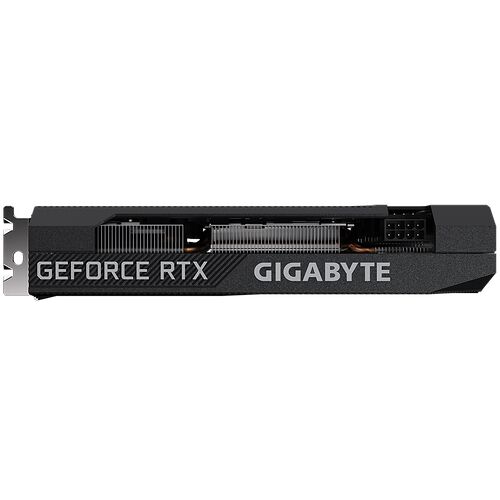 Carte graphique Gigabyte GeForce RTX avec un dissipateur thermique métallique visible sur un fond noir.