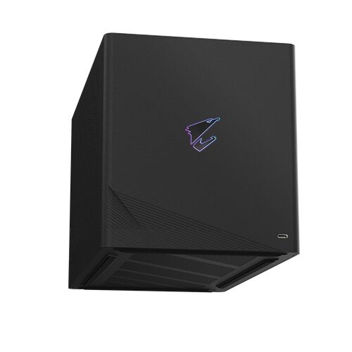 Boîtier PC Corsair de couleur noire avec le logo de la marque illuminé en violet sur la façade avant.