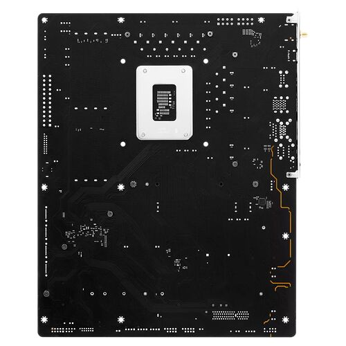Vue arrière d'une carte mère noire présentant le socket du processeur au centre et divers composants électroniques et circuits imprimés.