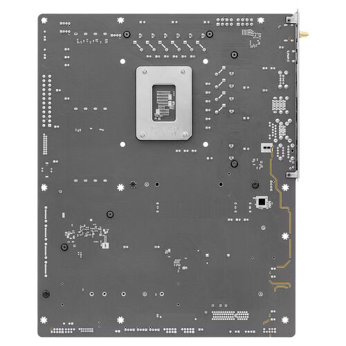 Vue arrière d'une carte mère de PC grise montrant le socket du processeur et divers composants électroniques soudés.