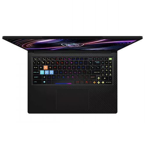 Un ordinateur portable gamer avec un clavier rétroéclairé multicolore et un châssis noir texturé. L'écran affiche un fond d'écran graphique aux tons violets et bleus.
