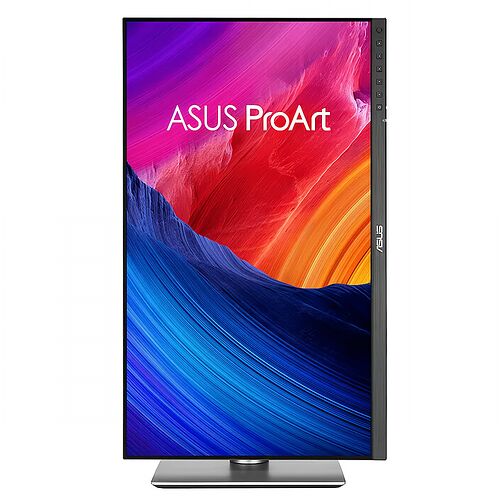 Écran ASUS ProArt affichant un fond d'écran abstrait aux couleurs vives (rouge, orange et bleu). L'écran est présenté sur son pied argenté.