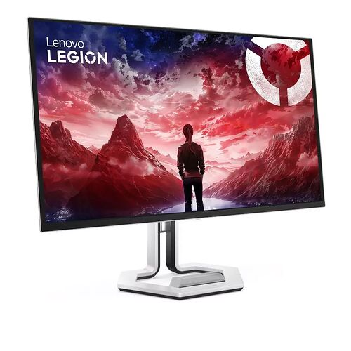 Écran de PC gamer Lenovo Legion affichant un paysage montagneux spectaculaire sous un ciel rouge et nuageux. L'écran est monté sur un pied argenté et noir.