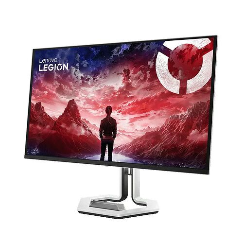 Écran de PC Lenovo Legion affichant un paysage montagneux spectaculaire sous un ciel rouge et violet. L'écran est monté sur un pied argenté et noir.