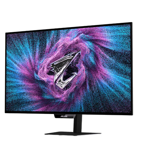 Écran de PC gamer Aorus avec un fond d'écran abstrait bleu et rose. L'écran est monté sur un pied noir fin.