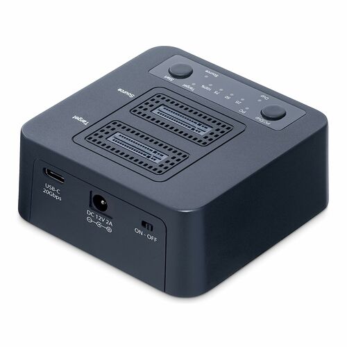 Boîtier de transfert de données avec ports USB-C et alimentation DC 12V, doté de boutons de contrôle et de voyants lumineux sur le dessus.