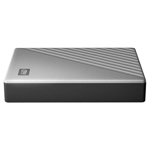 Un boîtier PC compact de couleur grise avec un design strié sur le dessus et le logo CM visible.