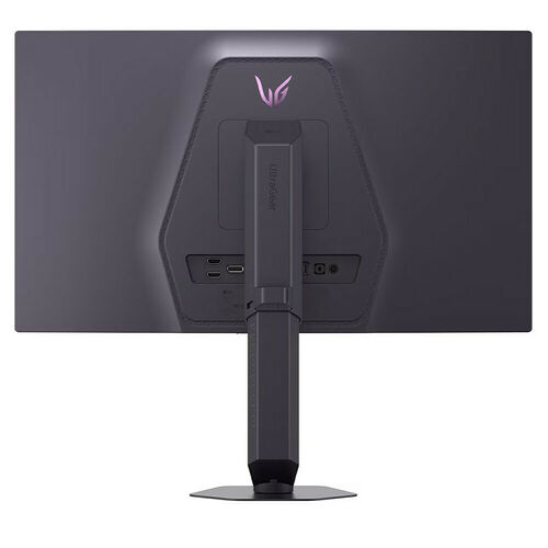 L'arrière d'un écran de jeu LG UltraGear gris foncé, montrant son pied de support et ses ports de connectivité.