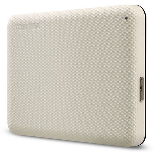 Disque dur externe Toshiba de couleur beige avec une texture quadrillée sur le dessus.