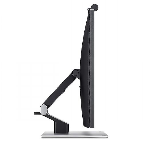Écran d'ordinateur de profil, montrant un design fin avec un pied réglable et une base plate argentée.