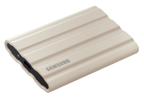 Disque dur externe Samsung de couleur beige avec une texture striée et le logo de la marque visible sur le dessus.