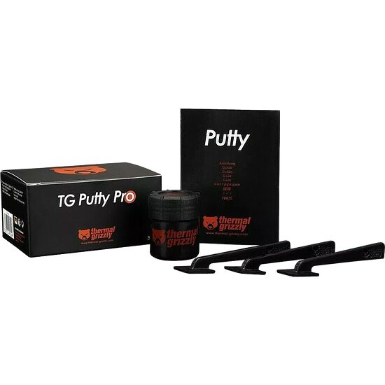 Pâte thermique Thermal Grizzly TG Putty Pro présentée avec sa boîte noire et ses petits applicateurs en plastique noir.