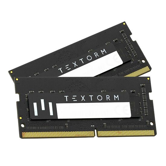 Deux barrettes de mémoire vive RAM de la marque Textorm, de couleur noire avec des étiquettes blanches.