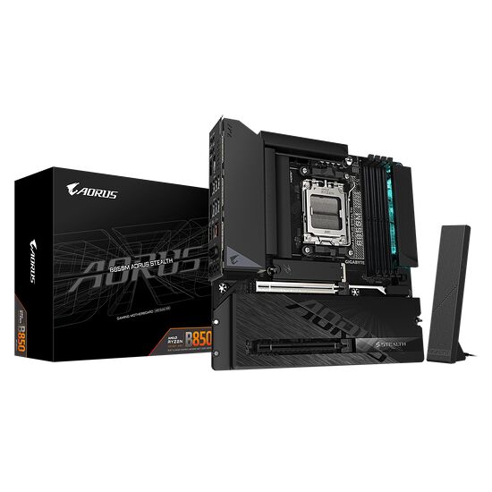Carte mère Gigabyte Aorus B850M Aorus Stealth avec sa boîte d'emballage, présentant un design noir avec des dissipateurs thermiques et des emplacements pour mémoire RAM.