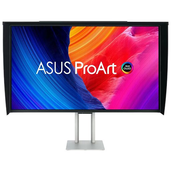 Écran ASUS ProArt avec dalle OLED, affichant un fond d'écran coloré aux nuances de bleu, orange et rose. L'écran est monté sur un pied argenté minimaliste.