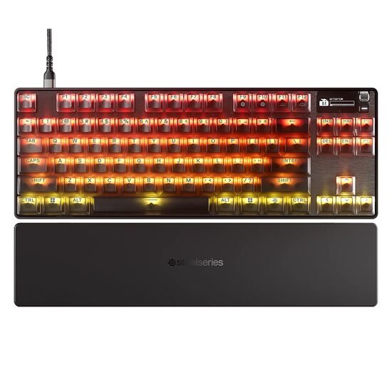 Clavier mécanique SteelSeries avec rétroéclairage RGB orange, présenté sur un support noir.