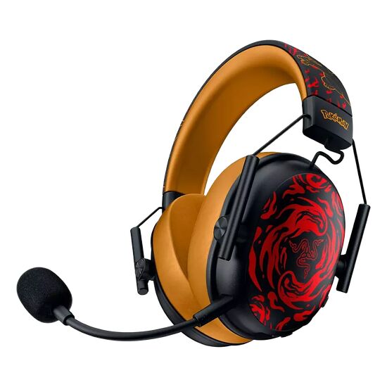 Casque audio Pokémon avec un design orange et noir arborant des motifs rouges stylisés et le logo Pokémon sur l'arceau. Il dispose d'un micro intégré pour le gaming.