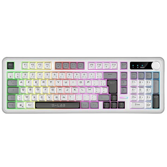 Clavier mécanique blanc avec rétroéclairage RGB multicolore, comprenant un pavé numérique et des touches de fonction.