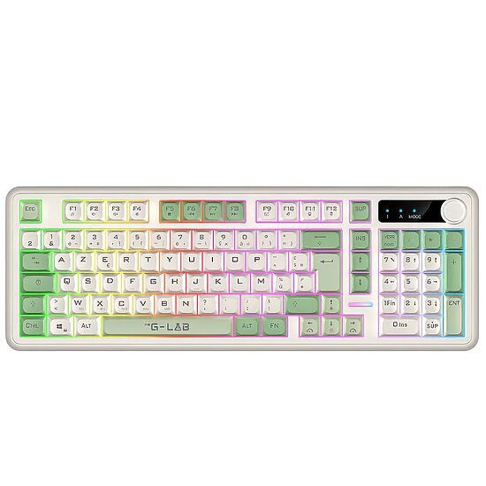 Clavier mécanique rétroéclairé avec touches vertes et blanches, présentant un pavé numérique et un design compact.