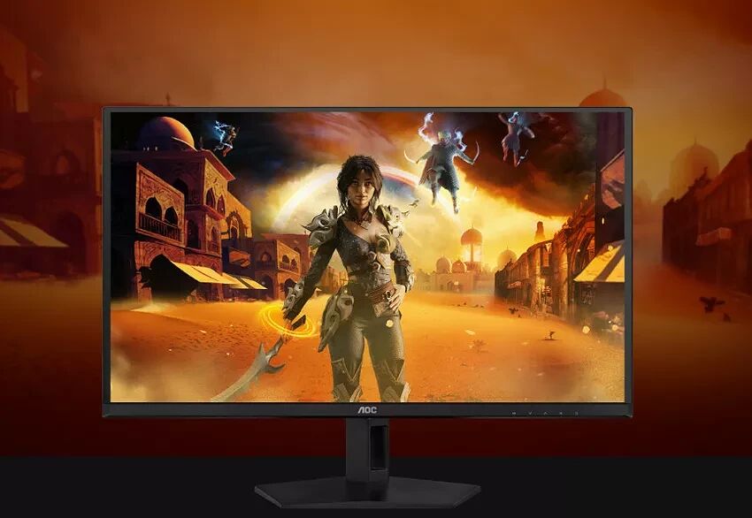 Écran de PC gamer AOC affichant une scène de jeu fantastique avec un personnage central dans un paysage désertique.