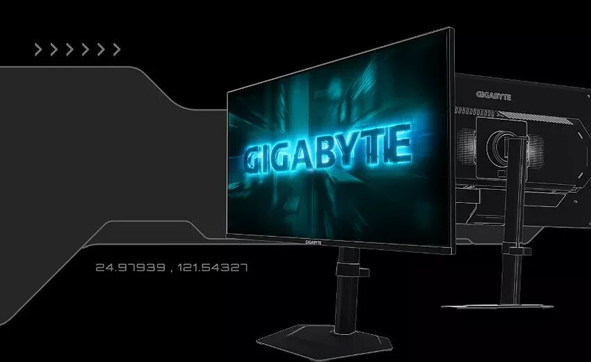 Écran de PC Gigabyte affichant le logo de la marque sur un fond bleu néon, présenté sur un pied de bureau noir.