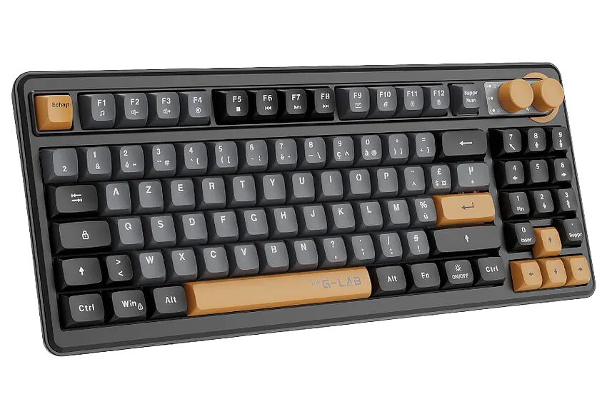Clavier mécanique G.LAB de couleur noire et beige avec touches de couleur marron clair. Il dispose d'un pavé numérique et de touches de fonction sur le dessus.