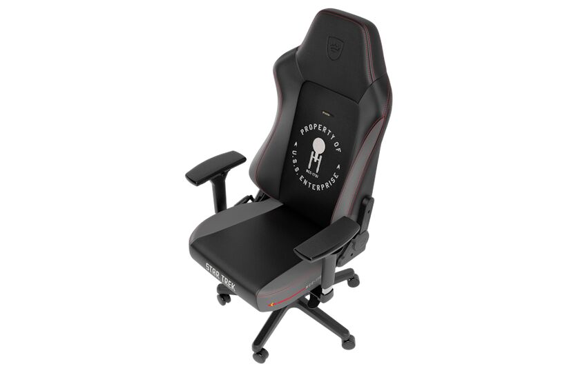 Chaise de bureau Star Trek noire avec des détails rouges et le logo "Property of U.S.S. Enterprise" brodé sur le dossier.