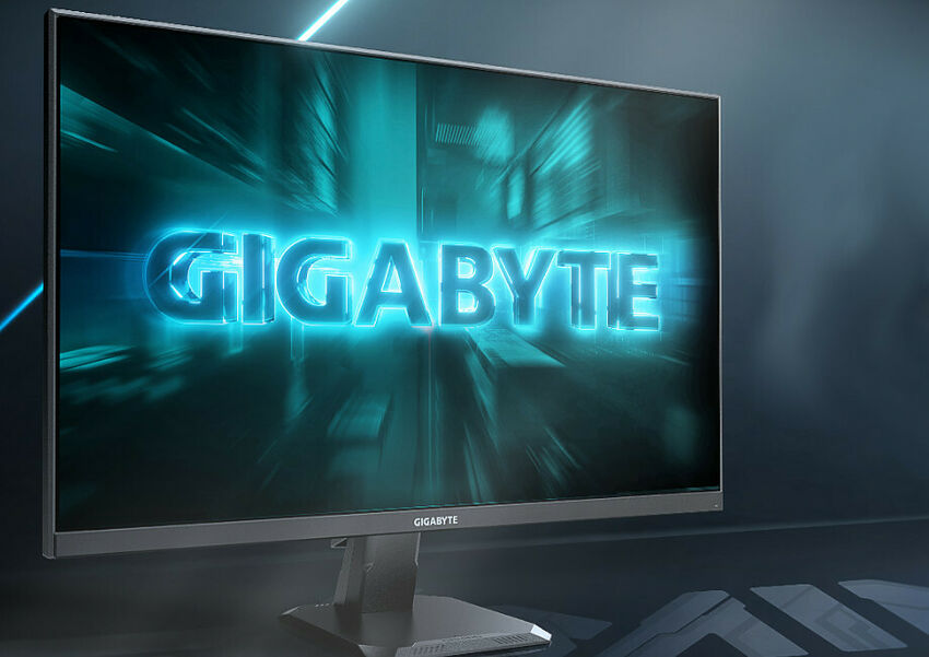 Écran de PC Gigabyte affichant le logo de la marque sur un fond bleu lumineux et dynamique.