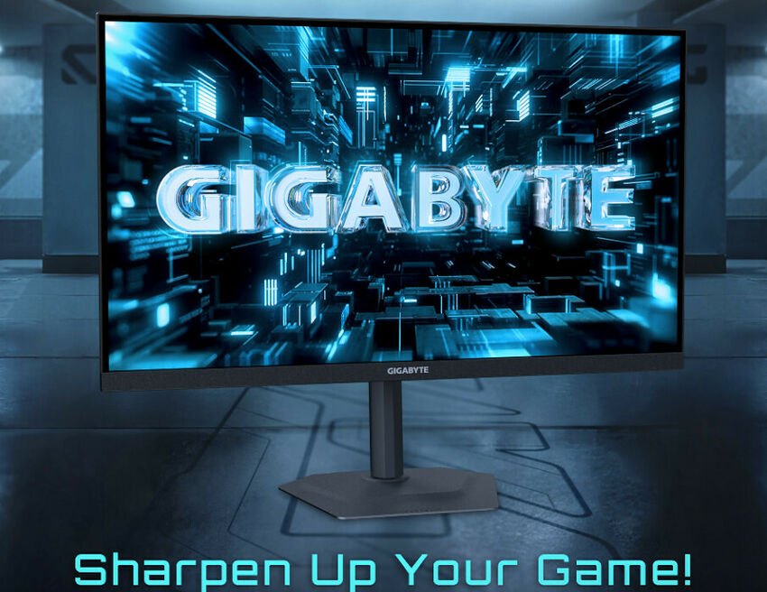 Écran de PC Gigabyte affichant un fond d'écran numérique bleu et noir avec le logo Gigabyte au centre.